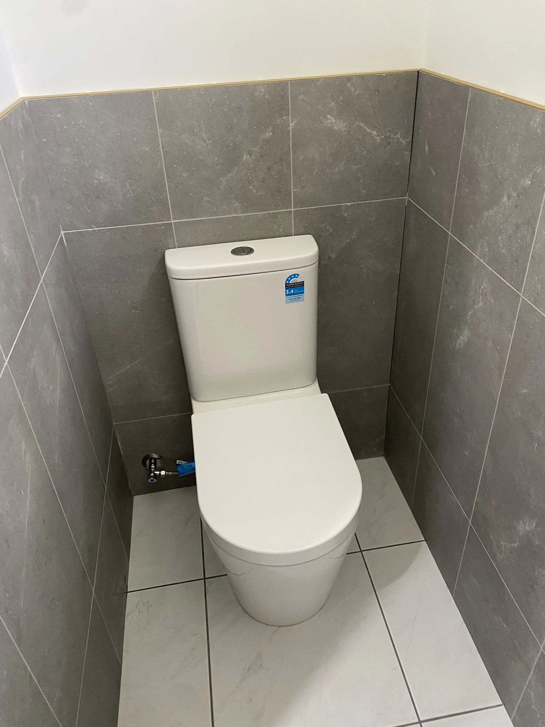 Toilet installation grey tiles Gold Coast