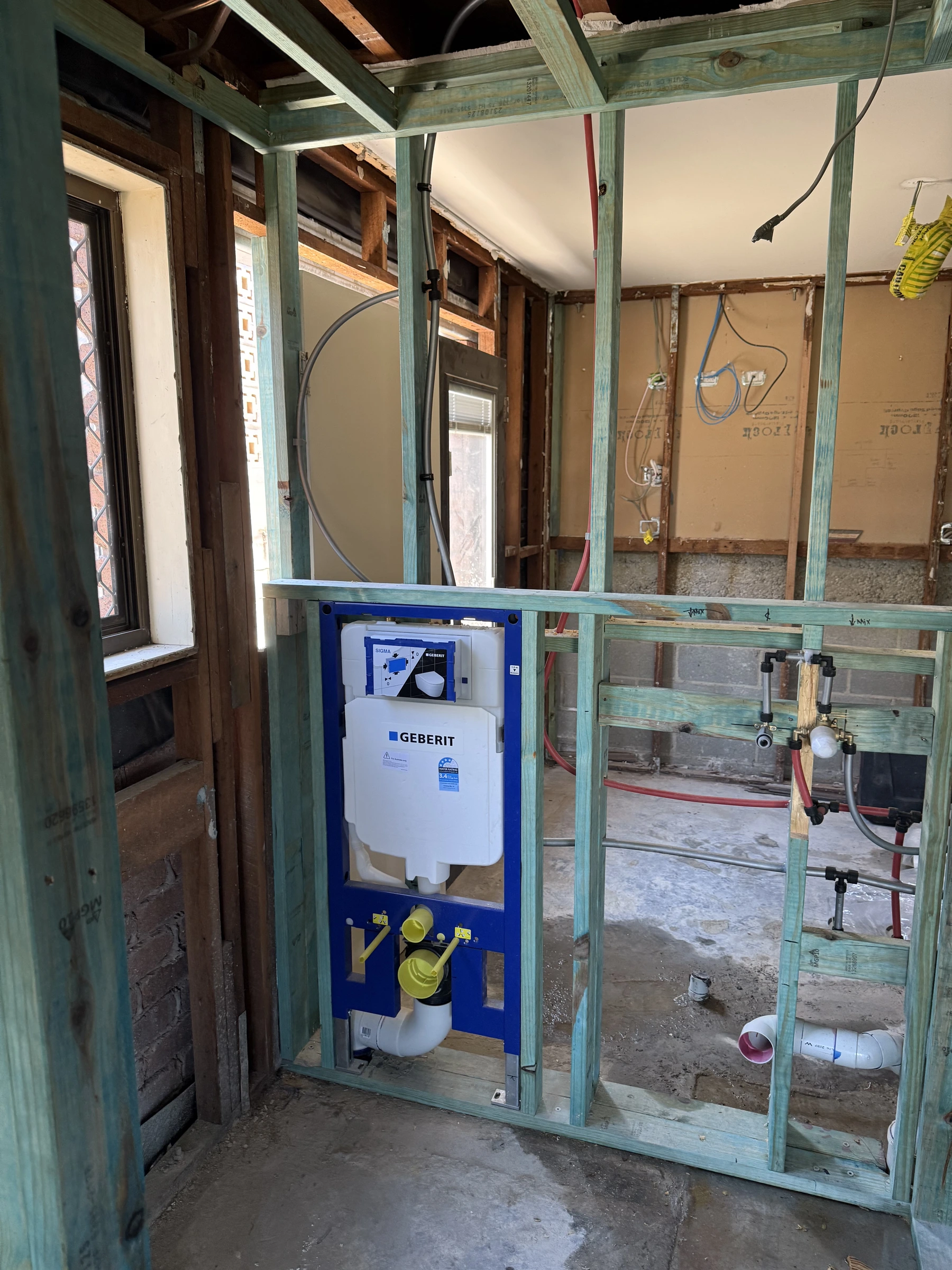 Geberit in-wall cistern rough-in bathroom renovation Gold Coast